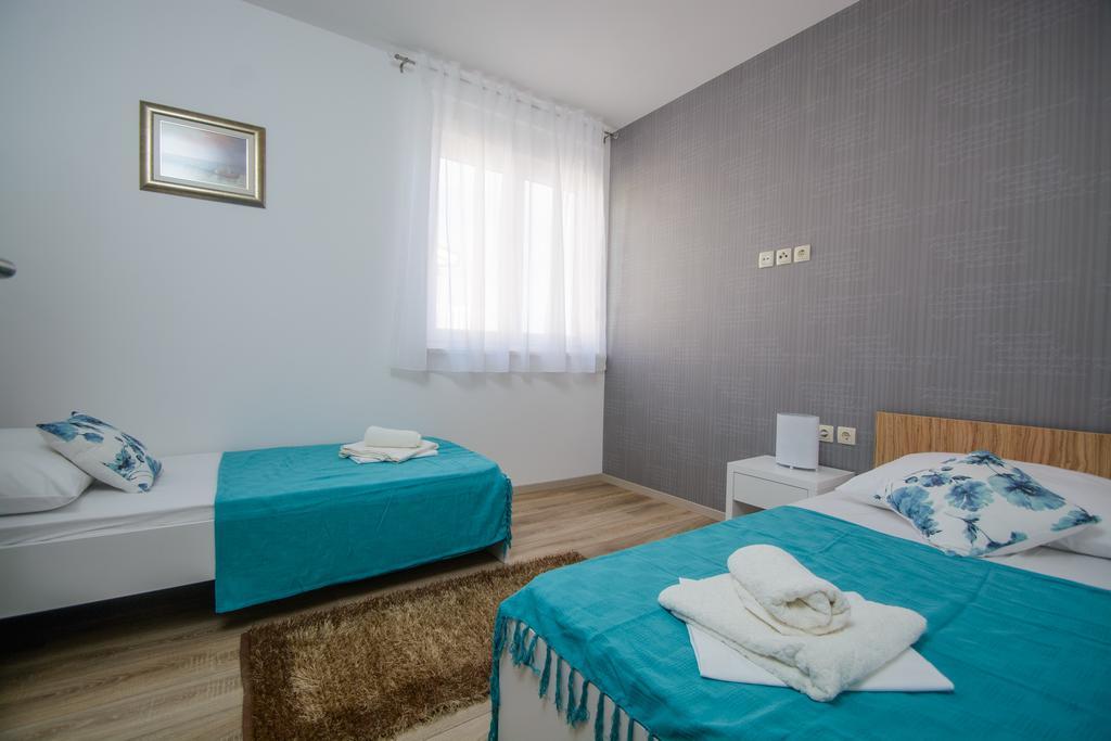 Apartments Villa Atlantis Trogir Bagian luar foto